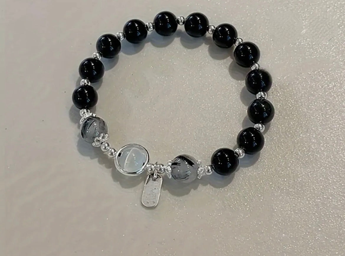 Peace charm bracelet
